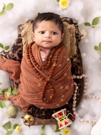A wide-eyed little Shiva. Even when they are awake, I can capture beautiful, calm moments during a newborn session.