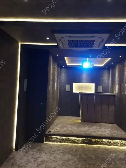 A duplicate image of a fully integrated theater room, showing the layout and lighting design.