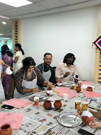 It’s not just about canvas! For this festive corporate event, we did a pot painting session, and the results were so vibrant. I can customize activities like pot or bottle painting to fit your team's goals or a special occasion.