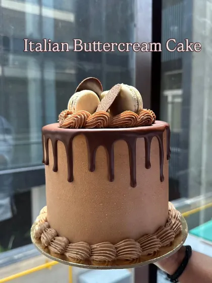 An Italian Buttercream Cake with a rich chocolate drip and macarons. This was another beautiful creation from my classical cakes week at pastry school.