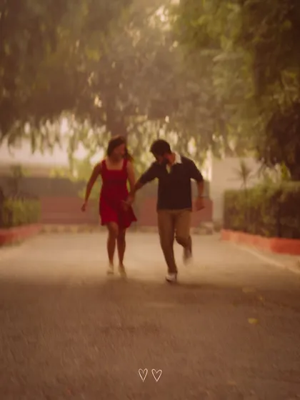 A motion-blurred shot of us running hand-in-hand. I use creative techniques to convey the energy and happiness of the moment.