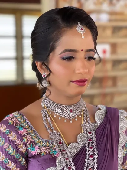 Another angle of Nayan's reception makeup, highlighting the flawless base and the beautiful shimmer on her eyes.