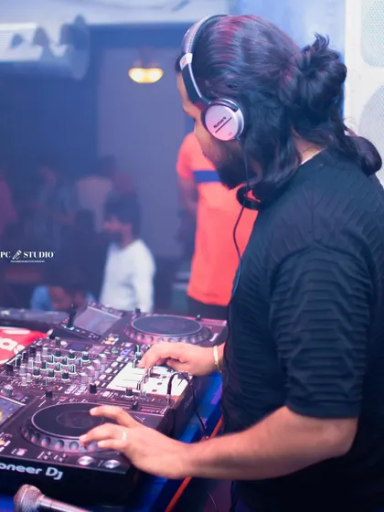 These shots capture me in my element, from different angles and at various events. Each one is a glimpse into my life as a music maker, focused on the craft and connecting with the crowd.