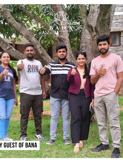 This team took a moment to pose for a group photo under the shade of our large mango trees after a session of activities.