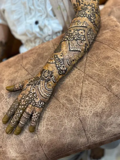 This is a detailed view of my intricate bridal henna work. Each design is unique, combining traditional patterns like paisleys and mandalas with fine-line fillers to create a stunning, full-coverage look for your special day.