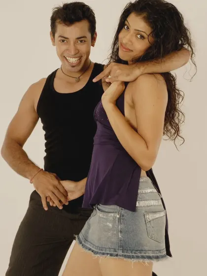 An early photoshoot, back when we were just starting to figure out our style. It's been a long road of growth, both as dancers and as partners.