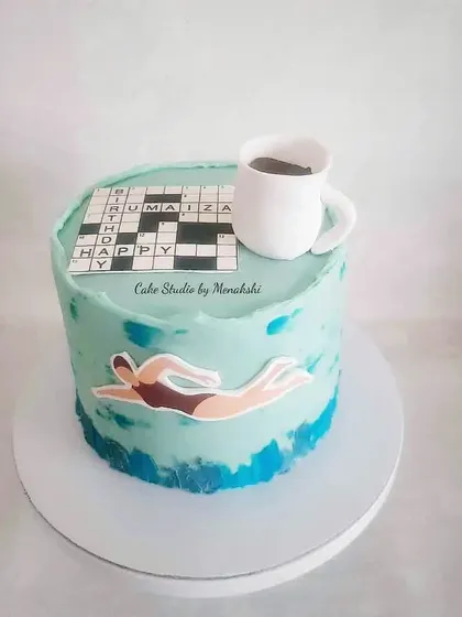 A cake for a swimmer who loves doing the crossword with his morning coffee. A truly unique and personal design.