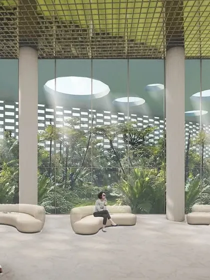 This rendering envisions the grand arrival lobby for a hotel, featuring large circular skylights and sculptural columns. The design aims to create a sense of awe while connecting guests to the landscaped gardens visible through the floor-to-ceiling glass.