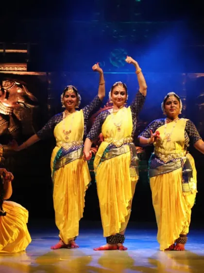 A full gallery from a special performance in my hometown after 25 years, showcasing a full group of dancers on a professionally lit stage.