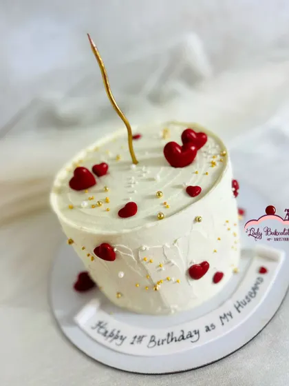 A simple and sweet heart-themed cake to celebrate a first birthday as a husband. Sometimes, less is more.