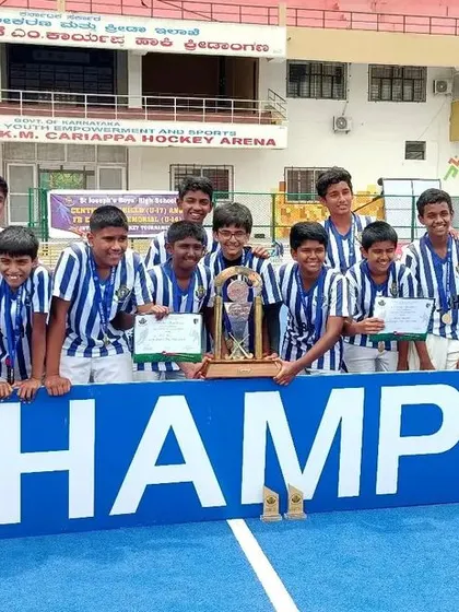 Champions! The SJBHS U-14 team celebrates their win of the Eric Vaz Memorial Trophy. We focus on building a strong foundation of skills that leads to results like this.