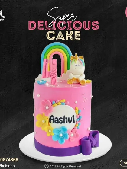 A sweet and colorful unicorn cake for a 4th birthday. This bright pink cake is decorated with a rainbow, a cute unicorn, and vibrant flowers, personalized with the birthday girl's name.