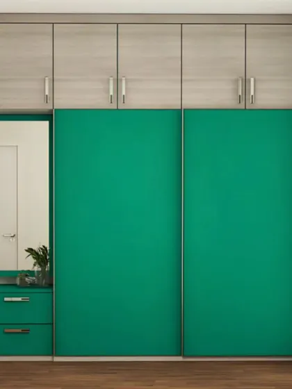 A modern sliding wardrobe with a bold pop of teal. This design includes a full-length mirror integrated into the side unit, combining storage and a dressing area in one compact piece.