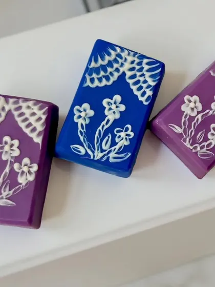 A different angle of the brush embroidery soaps, showing the fine details.