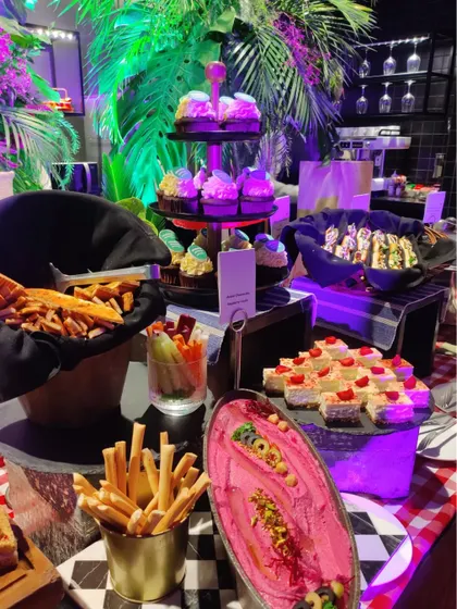 This shot highlights the variety on our Spotify grazing table, from fresh vegetable sticks and dips to savoury fries and pastries. We design our tables to be both visually appealing and full of delicious options.