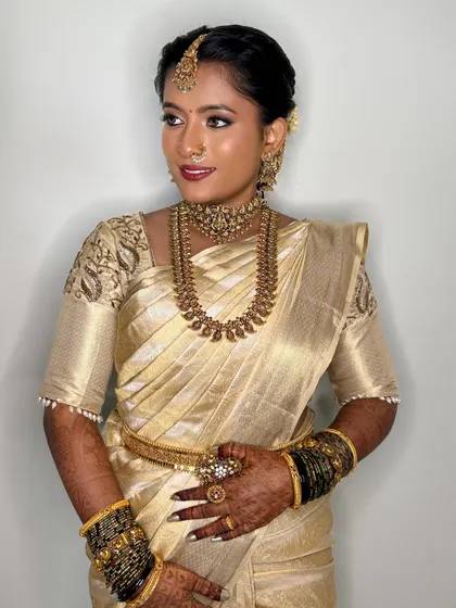 A profile shot showcasing the clean lines and beautiful finish of the airbrush makeup. This technique is perfect for brides who want a long-lasting, lightweight feel.