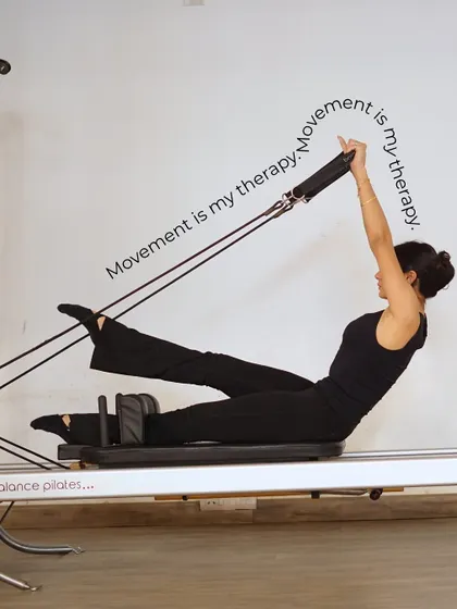 Movement is my therapy. This client demonstrates a perfect teaser, a testament to core strength and control.