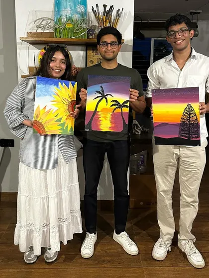 Three happy painters with their finished artworks from one of our public workshops. I love seeing the different interpretations of the themes we paint.