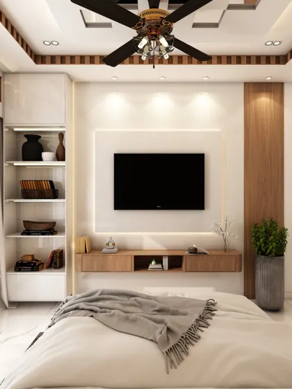 The TV unit in the same master bedroom, designed with a floating console and backlit panel to maintain a clean and modern look.