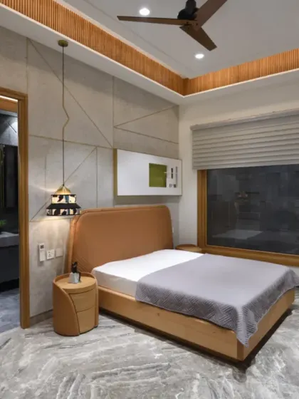 The guest bedroom in the Screen House features a minimal yet modern design. Its elegant palette of beige, brown, and grey creates a warm and inviting atmosphere, balancing simplicity with sophistication.