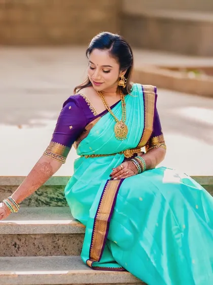 Tejaswini looking serene and beautiful for her Varpooja. The makeup is soft and natural, letting her glow from within.