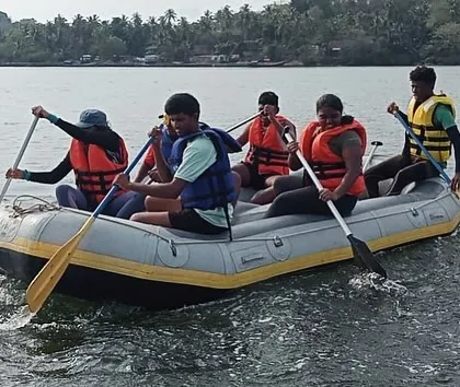 A team of five learns the basics of rafting on the calm sea at Karwar, a great introduction to the sport.