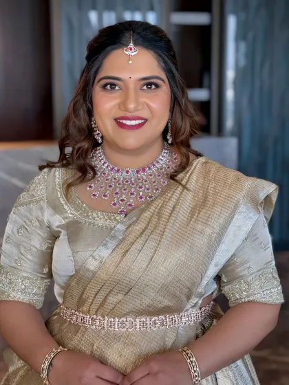 Likitha celebrating her baby’s naming ceremony. I gave her a soft glam look with a bold lip to complement her gorgeous gold tissue saree.