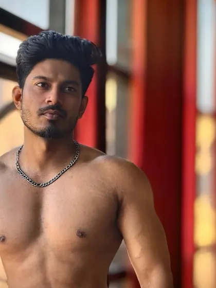 Hunter by nature. A shirtless portrait in the gym.
