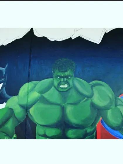 The final result is a powerful scene. The Incredible Hulk takes center stage, flanked by Batman and Superman, ready for action.