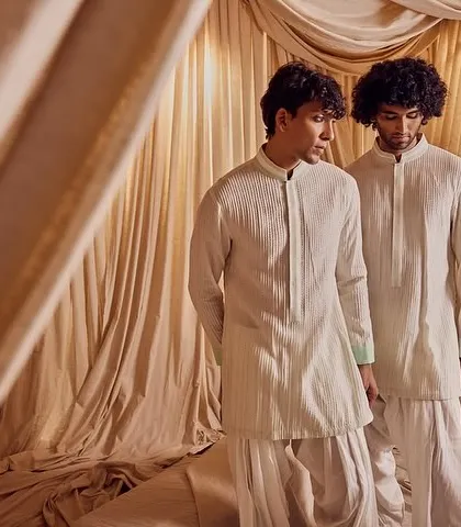 Grooming for two models in the Kunal Anil Tanna campaign. I ensured both models had a consistent, clean, and camera-ready look that complemented the light-colored ethnic wear.