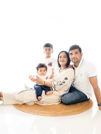 A relaxed and happy family portrait on the floor. I encourage families to get comfortable and interact naturally during our sessions.