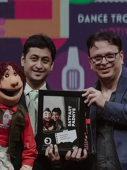 Being felicitated by industry veterans at the WOW Awards is always a humbling experience. Here I am receiving my award with my ever-present partner.