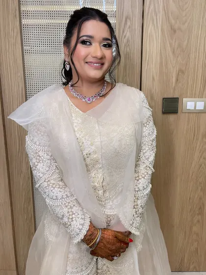 The bride looks radiant and happy, ready for her sangeet night.