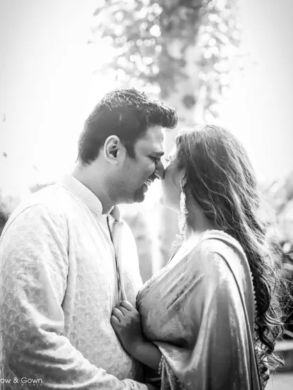 The black and white version of a romantic, sun-flared Roka portrait. The high contrast and backlighting create a dramatic and timeless feel.