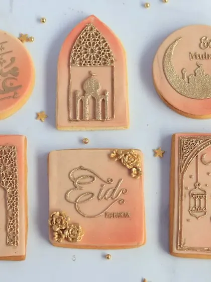 A collection of my hand-decorated Eid cookies, showcasing various designs with elegant gold detailing. These vanilla butter cookies are almost too beautiful to eat.