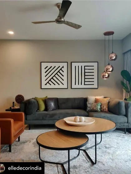 As seen in Elle Decor, this living room features our nested wooden coffee tables. The simple, modern design provides a warm, organic counterpoint to the room's contemporary furnishings.