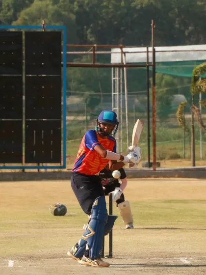 A batsman plays a powerful shot during the ODI showdown in Dehradun.