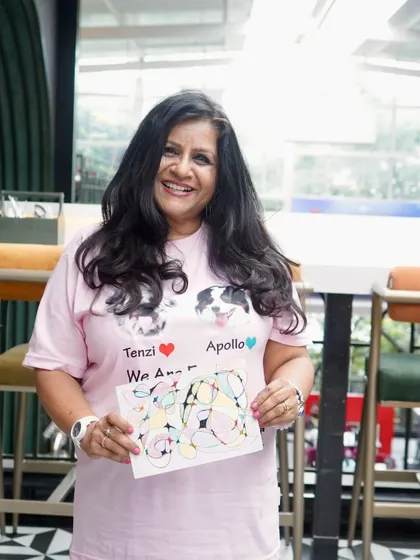 One of our wonderful supporters showing off her creation at the art workshop. Events like these bring our community together in joyful and creative ways to help animals.