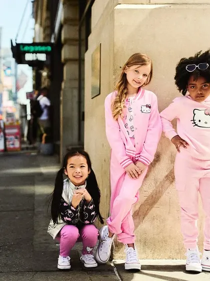 A group shot on 7th Avenue. I directed the kids into a casual, cool pose that feels natural and showcases their individual styles.