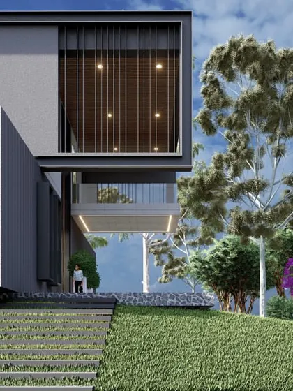 A modern farmhouse design set into a green, rolling landscape. The cantilevered sections and large windows are designed to maximize views and connect the interior with the natural surroundings.