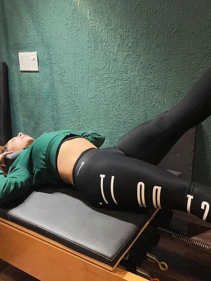 This is our Reformer Pilates in action. The equipment uses spring-based resistance to challenge your entire body, helping to build long, lean muscles and improve core stability. It's a fantastic way to achieve a deep, full-body workout with precise, controlled movements.