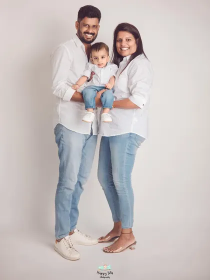 A full-length family portrait showcasing a classic, casual style. This setup is perfect for creating images that will look great on your walls for years to come.