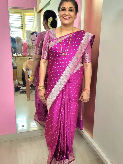 A lovely Banarasi saree draping for a client's birthday celebration. The pleats are kept 'fluffy' and neat for a classic and celebratory look.
