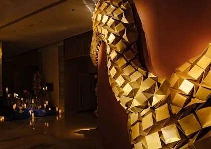 A close-up of the massive, golden origami installation that snaked through the entrance of the Sangeet venue.