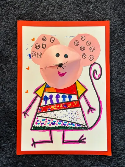 My first graders had so much fun making these doodle-patterned mice with 3D paper faces.