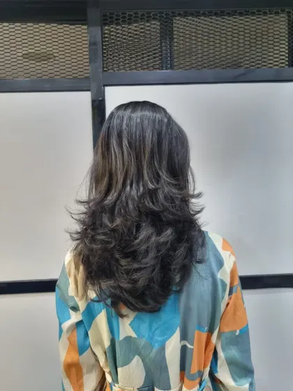 A gallery of finished haircuts, showing the beautiful layers and shape from the back. You can see the volume and texture each cut creates.