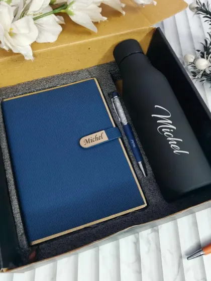 This classic blue diary and black temperature bottle set is another great option for a personalized gift. The diary features a custom nameplate on the strap.
