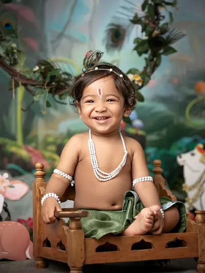 Another joyful shot from our magical forest Krishna theme. The little boy's happiness is contagious, and it's moments like these that I love to capture.