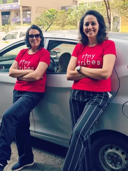 My partner Aman and I leaning against our car, ready for another day of classes. We are on a mission to find every parent in Navi Mumbai and show them the magic of play based learning.