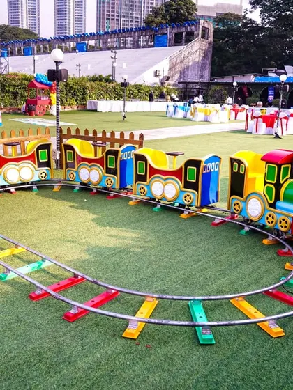 All aboard the party express! Our colorful mini-train ride takes children on a fun journey around the party grounds, perfect for outdoor venues and younger kids.